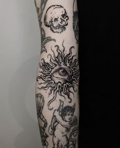 a person with a tattoo on their arm and some other things in the back ground