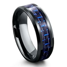 Mens black polished tungsten carbide wedding band designed with crafted beveled edges. Inlaid with a black and blue woven carbon fiber inlay. Using the highest quality tungsten, this ring is both extremely durable and comfortable. Specifications Material: Tungsten Polish Black Tungsten Beveled Edges Black & Blue Woven Carbon Fiber Inlay Comfort Fit Width 8mm Water Proof High Scratch Resistance Hypoallergenic Shipping Free Shipping on All Orders U.S. Domestic Shipping: 3 to 6 Days Internation Black Tungsten Carbide Ring, Black Titanium Ring, Carbon Fiber Rings, Wedding Band Designs, Tungsten Carbide Wedding Bands, Titanium Wedding Band, Black Tungsten, Tungsten Carbide Rings, Black Polish