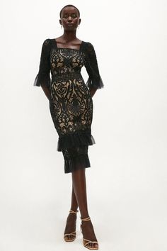 This temptingly romantic dress nods to your femme fatale side. Detailed with opulent lace, frothy tulle trims and a square neckline, it makes an eye-catching choice for atmospheric dinner dates or a special black-tie event.Style: Midi DressFabric: LaceLength: MidiNeckline: SquareSleeve Length: Long Sleeve Wedding Guess Dress, Wedding Guess, Black Lace Dress Long, Dinner Dates, Guess Dress, Romantic Dress, Lace Dress Black, Dresses Long Sleeve, Red Wedding