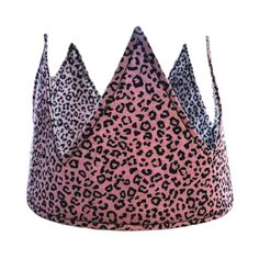 This super cute handmade birthday crown will make the perfect gift for a special birthday. An eco-friendly replacement to standard paper hats, these crowns can be used time and time again. Why not make it part of your family tradition? These hats are fully machine washable so no need to worry about the cake smash photos.  There are 2 options for fastening; fabric ties or fabric covered elastic. If selecting the elastic option then please note the circumference of the recipient's head when purchasing for a secure fit. Made from 100% cotton with a stiffened interior, they are durable and make to last. Washing instructions: Machine washable at 30o Do not tumble dry, Stretch out to reshape whilst wet, Iron without steam Whimsical Tall Crown As Gift, Adjustable Pink Crown With Round Shape, Zero Waste Party, Montessori Birthday, Paper Hats, Fabric Crown, Paper Hat, Cake Smash Photos, Family Tradition