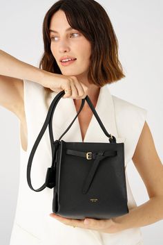 [vc_row][vc_column width=”1/3″][vc_column_text text_larger=”no”] Oroton Women’s Margot Mini Bucket Bag   Oroton Margot Mini Bucket Bag The Oroton Margot Mini Bucket Bag, a versatile accessory made with high-quality pebble leather which features a top zip closure for added security. The spacious main compartment includes an internal slider pocket to keep your essentials organized. With its sleek and modern design, the bag is unlined and has a fused faux leather Mini Bucket Bag, Mini Bucket Bags, Mini Bucket, Pocket Top, Embossed Logo, Online Bags, Brass Color, Crossbody Strap, Pebbled Leather