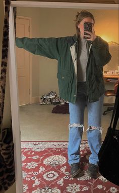 Rainy Days Outfit Aesthetic, Rain Cold Outfit, Docs Rainy Day Outfit, Winter Nature Outfit, Raincoat Aesthetic Outfit, Parka Outfit Aesthetic, Green Winter Coat Outfit, Outfits With Rain Jackets, Winter Rain Outfit Cold Weather