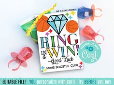 a card that says ring in the win next to some scissors and other crafting supplies