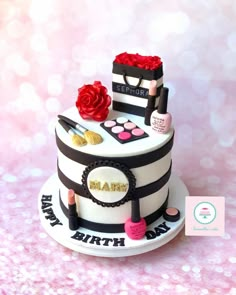 a birthday cake with makeup and lipstick on it