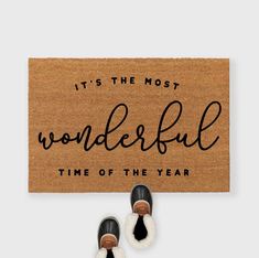 a door mat that says it's the most wonderful time of the year