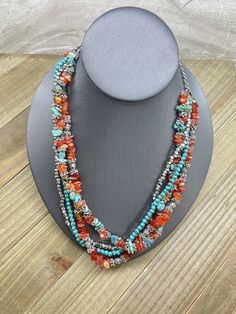 This exquisite 4 strand Southwestern style Silver-Tone necklace is meant to capture attention with its Turquoise and Carnelian clusters, making whoever wears it stands out. At length it is 13 in' and weighs 107g and is in beautiful condition. Southwestern Multi-strand Turquoise Gemstone Necklace, Southwestern Multi-strand Turquoise Beaded Necklace, Southwestern Multi-strand Gemstone Bead Necklaces, Southwestern Multi-strand Turquoise Necklace For Jewelry Making, Southwestern Multi-strand Necklace With Gemstone Beads, Southwestern Multi-strand Beaded Necklaces With Natural Stones, Southwestern Multi-strand Beaded Necklace With Natural Stones, Carnelian Agate, Agate Necklace