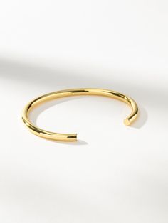 If you’re going for a simple look, this gold bracelet is the one for you. Our Simple Bracelet has a minimalist design that makes it the perfect accessory to any look. For a look our stylists love, pair this open bangle bracelet with our Remember Me Bracelet and Three's a Party Chain Bracelet. | Simple Gold Cuff Bracelet | Women's Jewelry by Uncommon James Uncommon James, Open Bangle Bracelet, Womens Cuff Bracelets, Solid Gold Bracelet, Simple Look, Bracelet Simple, Remember Me, Open Bangle, Simple Bracelets