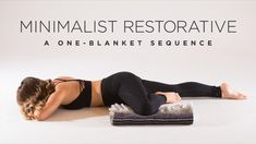 a woman laying on the ground with her back turned to the camera, in front of a white background that says minimalist restorative a one - blanket sequence