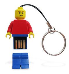 a lego man keychain is shown next to a pair of keys