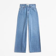 Elevate your wardrobe with the timeless elegance of Abercrombie & Fitch's Women's High Rise Wide Leg Jeans. Designed to flatter, these jeans feature a statuesque 10.5” high rise and a relaxed fit through the waist and hips, flowing into a wide, full-length leg for a striking silhouette. 

- Size: 34 SHORT
- Color: Medium Wash
- Material: Cotton, TENCEL™ Lyocell
- Gender: Female
- Age Group: Adult

Crafted from a blend of super soft, lightweight rigid denim, these jeans promise both comfort and d Classic High Waist Flare Jeans For Summer, Classic Medium Wash Flare Jeans For Summer, Classic Medium Wash Flare Jeans For Spring, Summer Classic Flare Jeans With Straight Hem, White Wide Leg Jeans, Womens Cropped Jeans, High Rise Wide Leg Jeans, Women's Bottoms, Denim Crafts