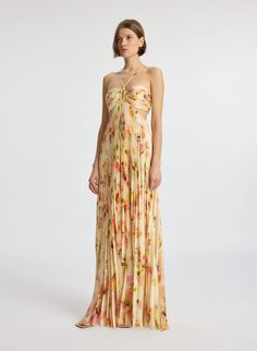 Details: 100% Polyester Dry Clean Not Lined Zipper Closure Length: 50" Model is 5'10" Wearing Size 4 Bust 31" Waist 23" Hips 34" Pleated Satin Dress, Plunge Dress, Halter Maxi Dress, Abstract Floral Print, Halter Maxi, Pleated Maxi Dress, Pleated Maxi, Halter Maxi Dresses, Pleated Dress