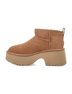 New Height Classic Ultra Mini Boots By Ugg. Featuring: Slip-on Style Round Toe Rear Pull Tab With Lace Recycled Polyester Heel Heel: 8cm Composition: Upper cow suede Lining 52. , 94% wool 35. , 3% tencel [lyocell] 11. , 76% unifi repreve recycled polyester Sole EVA Ultra Mini Boots, Ugg Shoes Women, Ugg Ultra Mini, Mini Boots, Ugg Classic Ultra Mini, Sheepskin Boots, Moon Boots, Ugg Classic, Classic Mini