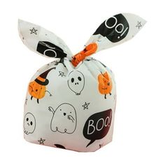 a white bag with halloween decorations on it