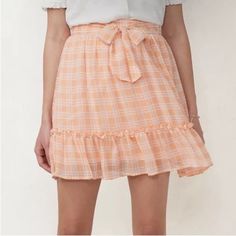 Lauren Conrad Checkered Ruffled Tiered Skirt Size Xxl New With Tags Checkered Pattern Fully Lined Bottom Ruffle Self-Tie On Waist Waist: 18” Length: 18 1/2” New With Partial Tags Casual Ruffle Hem Skort For Spring, Casual Skort With Ruffle Hem For Spring, Casual Tiered Skirt For Brunch, Summer Pleated Plaid Skort, Summer Plaid Pleated Skort, Plaid Pleated Skort For Summer, Casual Ruffled Skirted Skort, Casual Ruffled Flared Mini Skirt, Casual Skort With Ruffle Hem