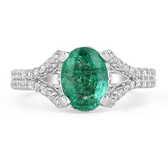 This is an exquisite, Colombian emerald and diamond halo split shank ring. The gorgeous setting lets sit an excellent quality Colombian emerald with beautiful color and very good eye clarity. The emerald is not perfect and small imperfections do exist as it is a natural gemstone. Near colorless diamonds halo around the emerald and down the split shank! This ring is incredibly comfortable to wear and would be an ideal engagement ring! Setting Style: Prong/Pave Setting Material: 14K White Gold Set Dazzling Oval Emerald Ring In Platinum, Oval Emerald Ring In 14k White Gold, Oval Emerald Ring With Accent Stones In Platinum, Oval Emerald Ring In White Gold With Diamond, Oval Emerald Ring With Prong Setting In Platinum, Oval Platinum Emerald Ring With Prong Setting, Oval Emerald Ring With Center Stone For Formal Occasions, Formal Oval Emerald Ring With Center Stone, Dazzling Oval Emerald Ring For Formal Occasions