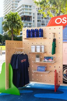 an outdoor display with various items on shelves