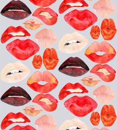 many different types of lips painted on white paper with red and orange lipsticks in the middle