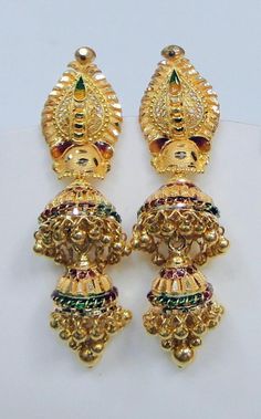 22K Gold hallmarked Handmade yellow gold dangle Earrings (Jumkee). Length-5 cm, Weight-14 Grams Gold Bridal Earrings With Latkans In Temple Jewelry Style, Gold Jhumkas For Ceremonial Festivals, Gold Tilla Danglers For Puja, Temple Jewelry Plug Earrings With Latkans For Festivals, Traditional Heavy 22k Gold Earrings, Heavy Gold Traditional Danglers, Traditional Heavy Gold Danglers, Ceremonial Heavy Gold Danglers, Gold Meenakari Jhumkas Earrings