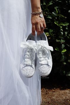 Step into personalized elegance with our exquisite collection of wedding sneakers tailored specifically for brides. Each pair epitomizes the perfect blend of style and comfort, ensuring that your journey down the aisle is not only memorable but also exceptionally comfortable. Our bride's wedding sneakers are meticulously crafted to reflect your individuality, offering customizable options such as adding your name and wedding date, all in a range of fonts and colors to match your unique vision. W Bride Gym Shoes, Bedazzled Wedding Sneakers, Sneakers For Bride, Wedding Sneakers For Bride, Pearl Sneakers, Pearl Outfit, Bride Sneakers, Wedding Shoes Sneakers, Bride Personalized