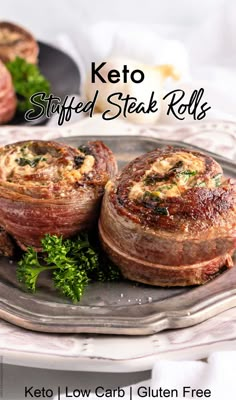 keto stuffed steak rolls on a plate with parsley