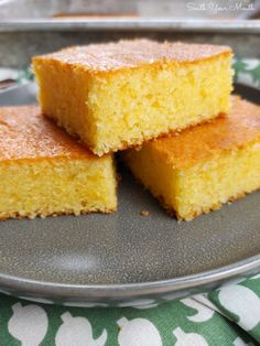 three pieces of cornbread on a plate