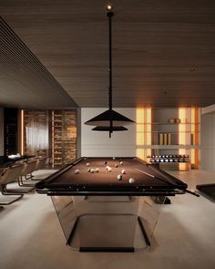 a pool table in the middle of a room