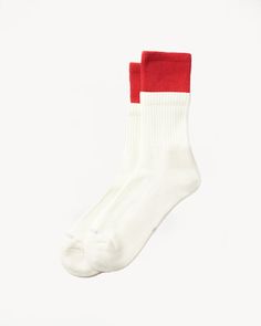 Rototo - Organic Cotton Double Layer Crew Socks - Red, Off White We don't know what it was about these socks, but they really caught our eye. They're made with what appears to be a double layer on the outside, but once you look inside you realize it's a pretty seamless design. The ribbing even varies from off-white to colored section. They're made with an organic cotton, which you know we love. The sole of the sock is once again made with pile knitting to make them feel like you're walking on a Red Sporty Socks For Winter, Sporty Red Socks For Winter, Red Socks, Men's Shoe, Recycled Bottles, Pet Bottle, Machine Knitting, White Painting, Knitting Socks