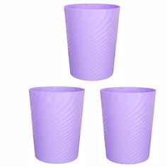 three purple cups sitting next to each other