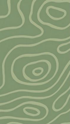 a green and white wallpaper with wavy lines