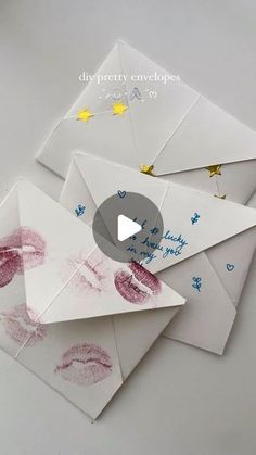 envelopes with handprinted lips and stars on them are being used as greeting cards