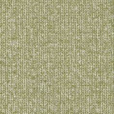 an upholstered green fabric textured with small white dots