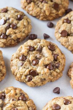 cookies and chocolate chips are arranged on a baking sheet with the words interest above them