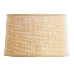 a beige lamp shade on a white background