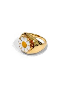 A gold finished ring with a cute lil daisy in the middle. The ring is around a size 7, but we encourage you to wear this as a ring for any finger- it looks great as a midi ring too! Pairs beautifully with our Groovy Nailz and the whole Smiley Collection. 100% Zinc Alloy. Keep away from moisture to prevent fading. Daisy Ring, Midi Ring, Midi Rings, Jewelry Lookbook, The Ring, Savannah, Gold Finish, Smiley, The Middle