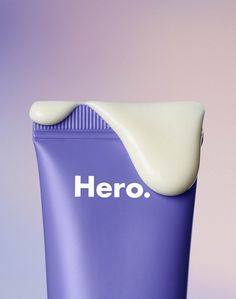 a purple tube with the word hero written on it and a white substance sticking out of it