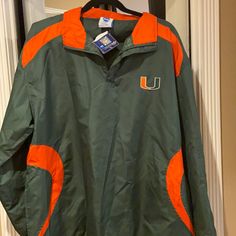 University Of Mimai Nwt Lightweight Wind Jacket. Ncaa Brand. Perfect For Fall Weather Football. It If All About The “U”! Orange Outerwear For Sports In Fall, Orange Long Sleeve Sports Outerwear, Seminole Florida, Gameday Couture, Wind Jacket, Auburn University, University Of Miami, Letterman Jacket, Wind Breaker