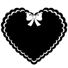 a black and white heart with a bow