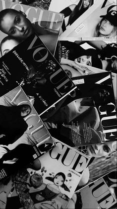 black and white photograph of magazines stacked on top of each other with the covers pulled down