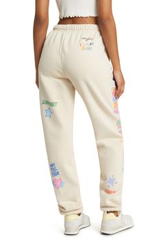 Surround yourself with angels in these slouchy cotton-blend fleece joggers brightly illustrated with angelic imagery. Elastic/drawstring waist Side-seam pockets Elastic cuffs 50% cotton, 50% polyester Machine wash, line dry Imported Dream Hoodie, The Mayfair Group, Graphic Joggers, Mayfair Group, Lounge Outfit, Hot Jeans, Surround Yourself, Gameday Outfit, Fleece Joggers