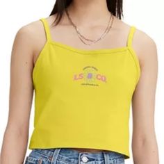 *Medium Armpit To Armpit Is 17 1/2 Inches, Length Is The Same As Pictured Above* This Beautiful Levi's Tank Top In Size L Is Perfect For Any Summer Day. The Spaghetti Straps And Sleeveless Design Make It Great For Staying Cool While The Yellow Color And Flower Theme Add A Pop Of Brightness To Any Outfit. Made Of A Soft 92% Cotton Mix Material, This Tank Is Both Comfortable And Stylish. Whether You're Dressing It Up Or Keeping It Casual, This Top Is Sure To Be A Favorite Addition To Your Wardrobe Flower Theme, Summer Day, Yellow Color, Levi's, Spaghetti Strap, Spaghetti, Tank Top, Womens Tops, Tank Tops