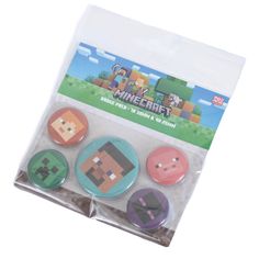 a pack of four buttons featuring minecraft characters