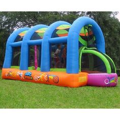 an inflatable bounce house with slide and blow up