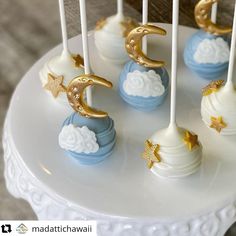 cake pops with moon and stars on them