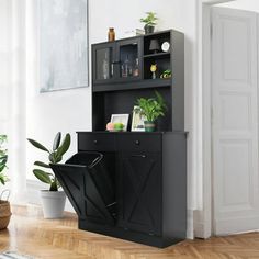 Upgrade your kitchen with Arlopu high-quality trash cabinet. Made with polished MDF wood, it's durable and easy to clean. It's not only a trash cabinet, but also a great kitchen storage cabinet with a spacious countertop and 2 pull-out drawers, storage shelves above the tabletop, providing enough space for small kitchen appliances and supplies, keep them clean and tidy. Arlopu Tilt out trash cabinet is not just for garbage cans. It can also hold laundry baskets, pet food bins, and more. The hidd Tilt Out Trash Cabinet, Cabinet Trash, Trash Cabinet, Trash Storage, Trash Can Cabinet, Laundry Sorting, Pantry Storage Cabinet, Kitchen Trash, Kitchen Pantry Storage