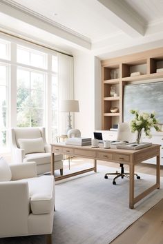 a living room filled with white furniture and lots of windows