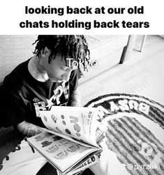 a young man sitting on the floor reading a book with an ad in front of him that reads looking back at our old chats holding back tears