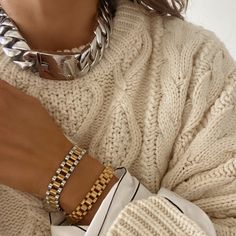 This stylish and modern Anisa Sojka watch band bracelet combines silver and gold for a unique, chunky look. Crafted from quality metals, it is sure to be a luxurious and long-lasting addition to any wardrobe. Silver meets gold, the dashing duo. Add a touch of edgy luxe to your look with this bold bracelet. Stack for a statement. Product DetailsMetal: 18K Gold Plated Stainless SteelLength: 18cm Width: 1cm Weight: 38gFold Over Clasp Bracelet Storage, Chunky Chain Necklace, Timeless Watches, Watch Band Bracelet, Chunky Chain Necklaces, Bold Necklace, Simple Tees, Band Bracelet, Classic Watches