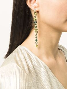 In vibrant shades of verdant green, these drop earrings feature a mix of classic cut crystals for an elegant yet playful twist on the essence of Swarovski crystals. Finished with a gold-tone plated setting, wear yours with the matching necklace from the Gema family for a prismatic statement. These earrings are part of the Gema family, designed by Creative Director Giovanna Engelbert for Collection III. Verdant Green, All That Glitters Is Gold, Classy Jewelry, Earrings Long, Crystal Embellishment, Matching Necklaces, Designer Earrings, Green And Gold, Women's Earrings