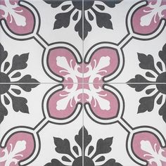 a pink and black tile with white designs