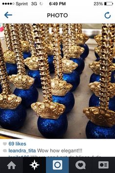 some blue and gold candy with chains on them